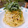 Espaguetis al pesto de rúcula