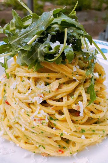 Espaguetis al pesto de rúcula