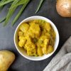 Curry amarillo de pollo con patata y guisantes